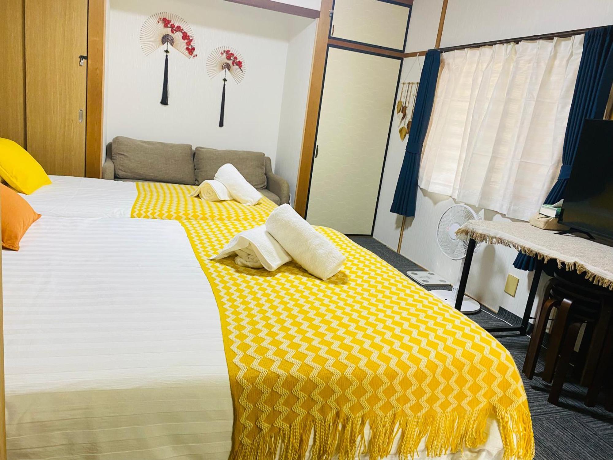 大阪民宿梅田淀川花b套 Appartamento *